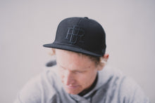 Snapback Flat Peak Cap Black - REEL BRAND